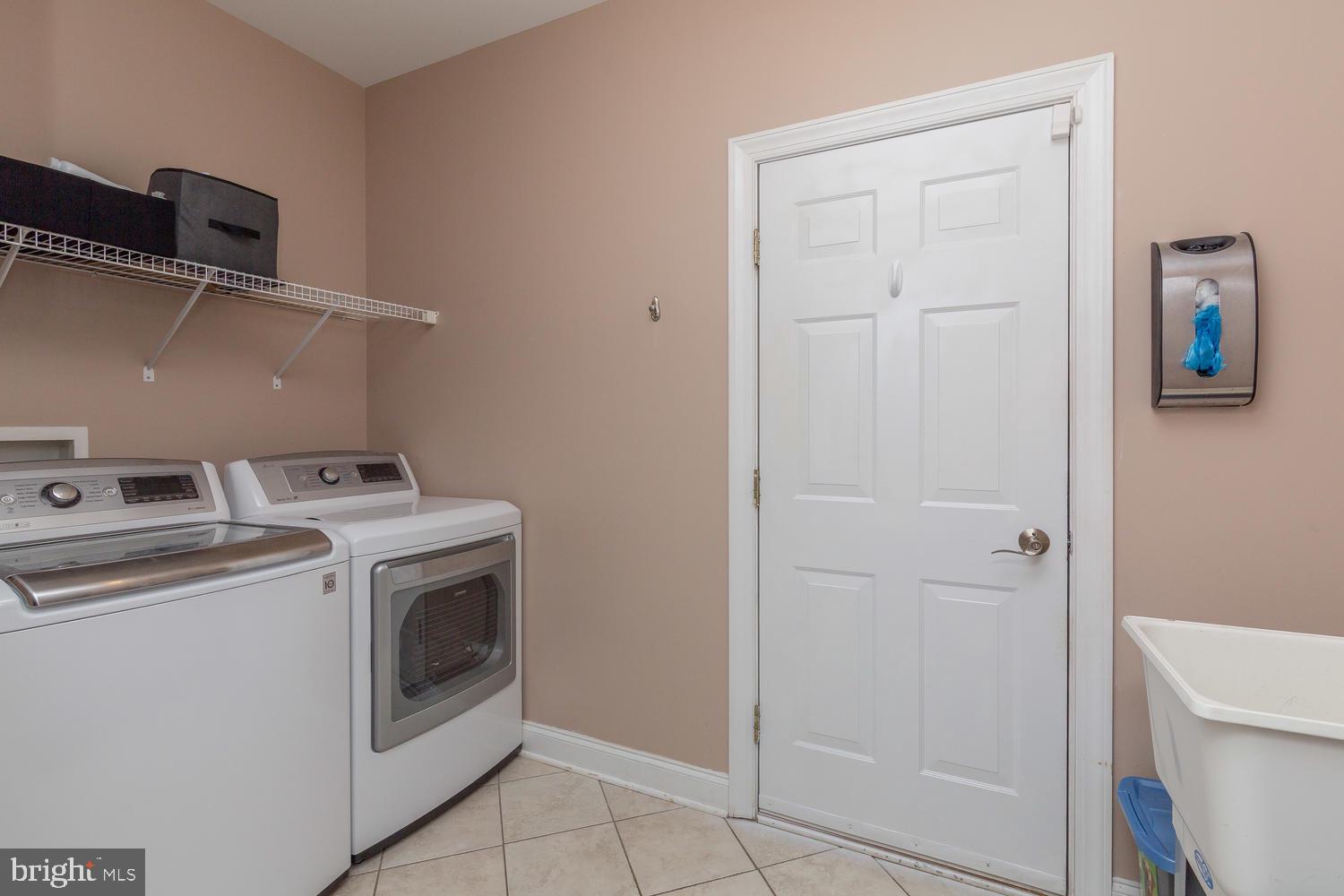 228 Southbank Road Landenberg, PA 19350 - Photo 26 of 46 Laundry room with garage access and utility sink