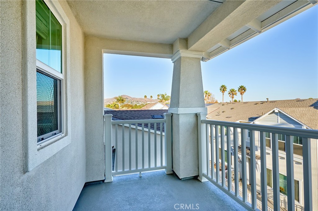 2448 Haley Pt Drive, Unit 105 Ventura, CA 93003 - Photo 13 of 27 a view of a porch with wooden floor