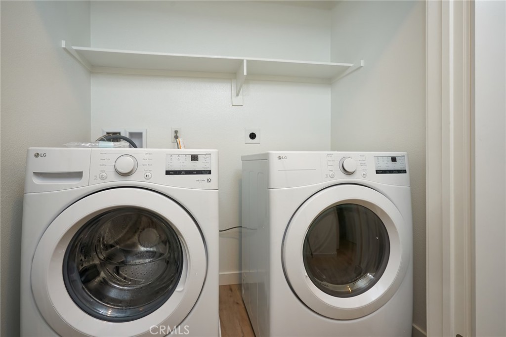 2448 Haley Pt Drive, Unit 105 Ventura, CA 93003 - Photo 19 of 27 a utility room with dryer and washer