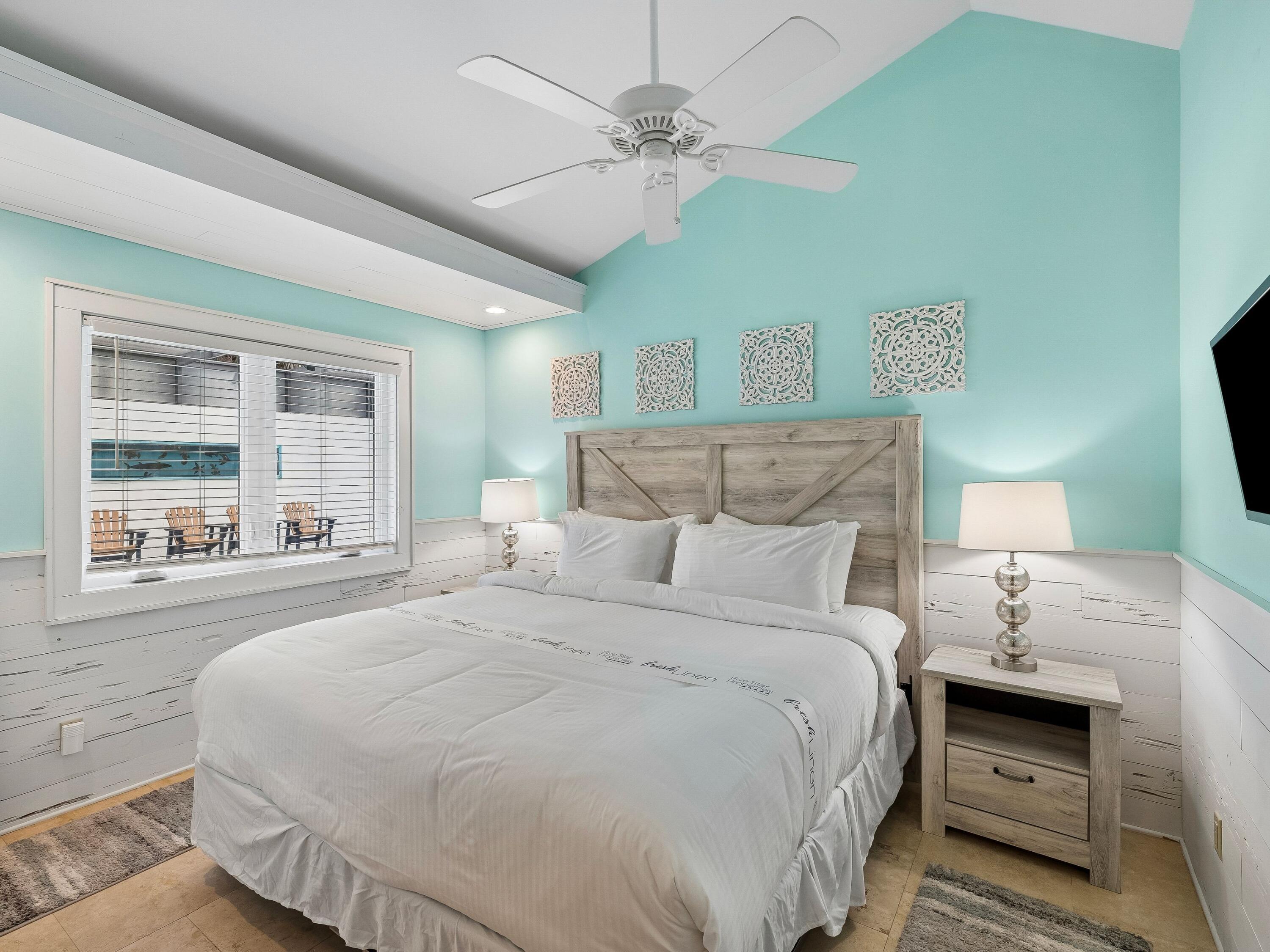 36 Green Street Inlet Beach, FL 32461 - Photo 20 of 27 a bedroom with bed and a window