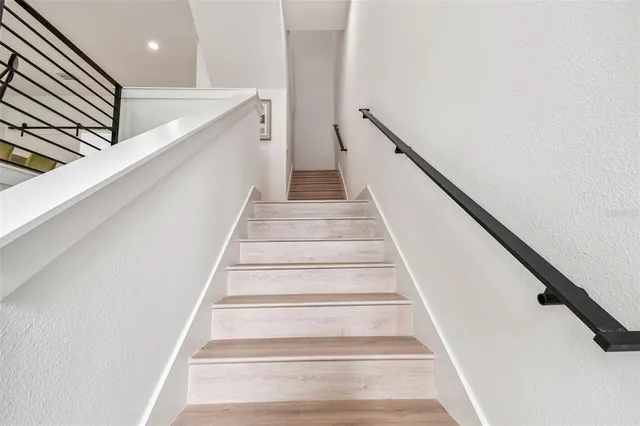 a view of a dining room with furniture and window