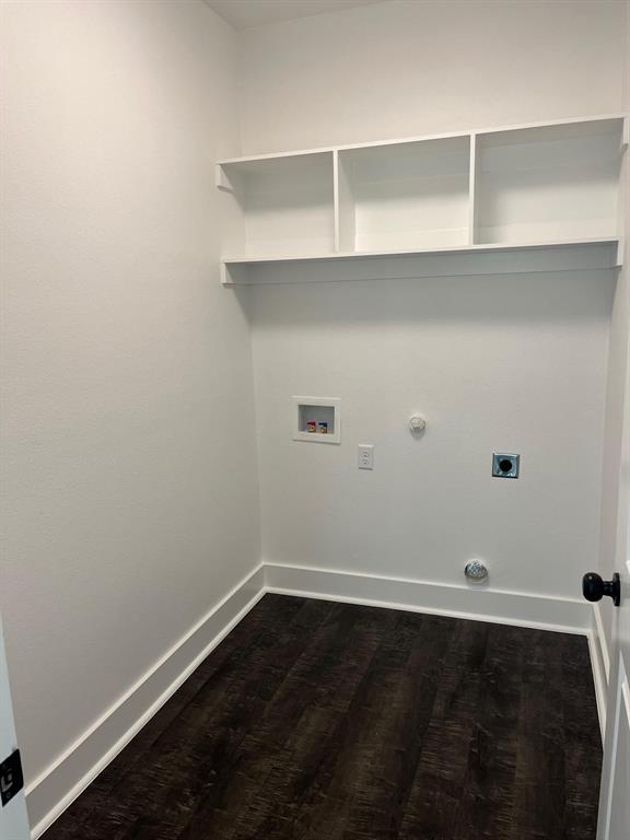 512 East Gandy Street Denison, TX 75021 - Photo 6 of 11 Washroom featuring gas dryer hookup, dark wood-type flooring, washer hookup, and hookup for an electric dryer