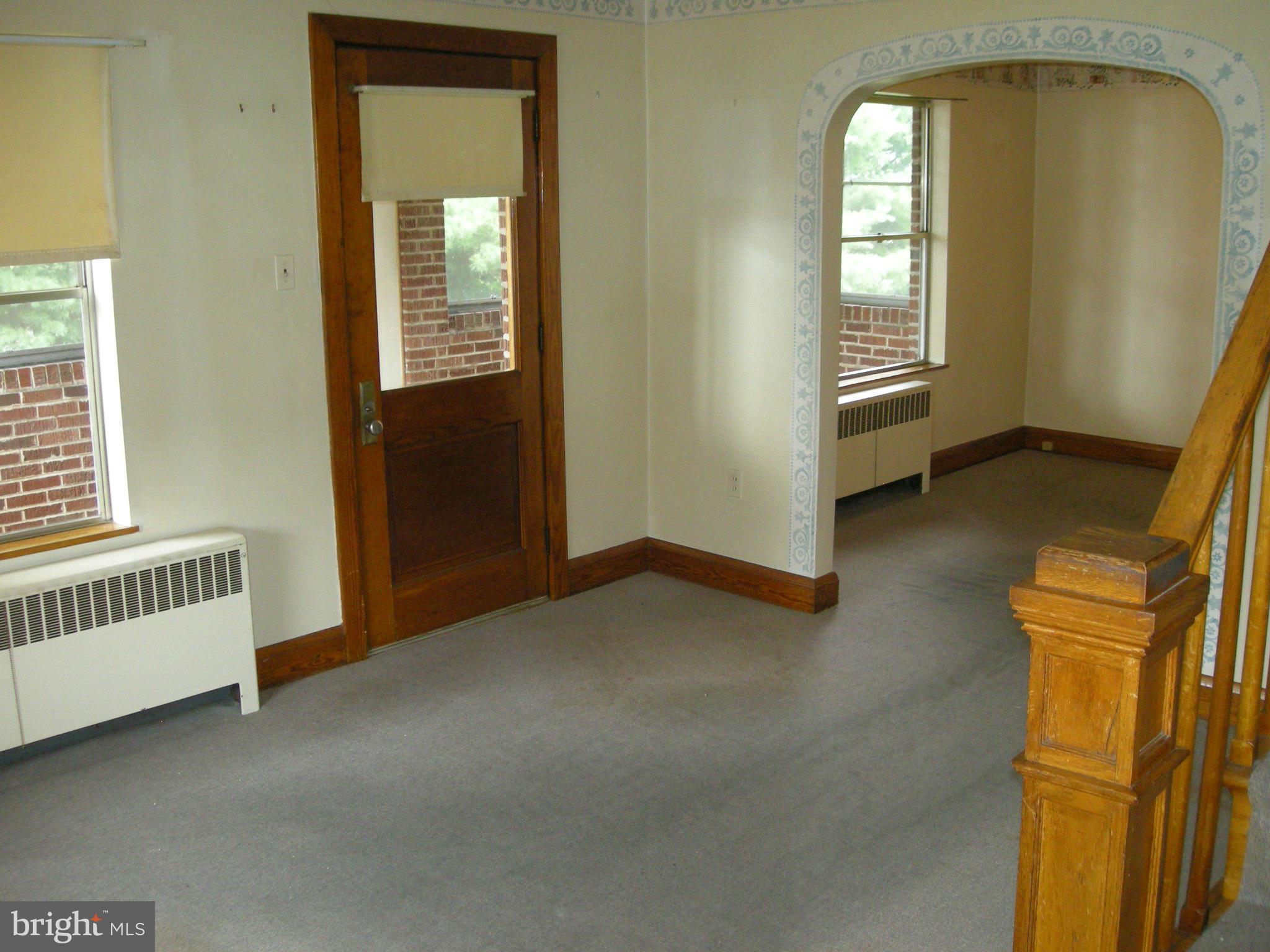7901 33rd Street Rosedale, MD 21237 - Photo 7 of 14 Living Room and porch to the left
