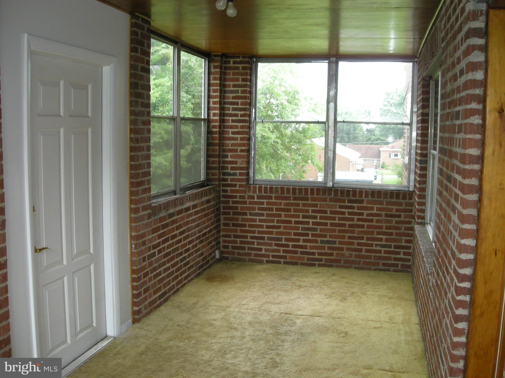 7901 33rd Street Rosedale, MD 21237 - Photo 9 of 14 Sun porch on side of house