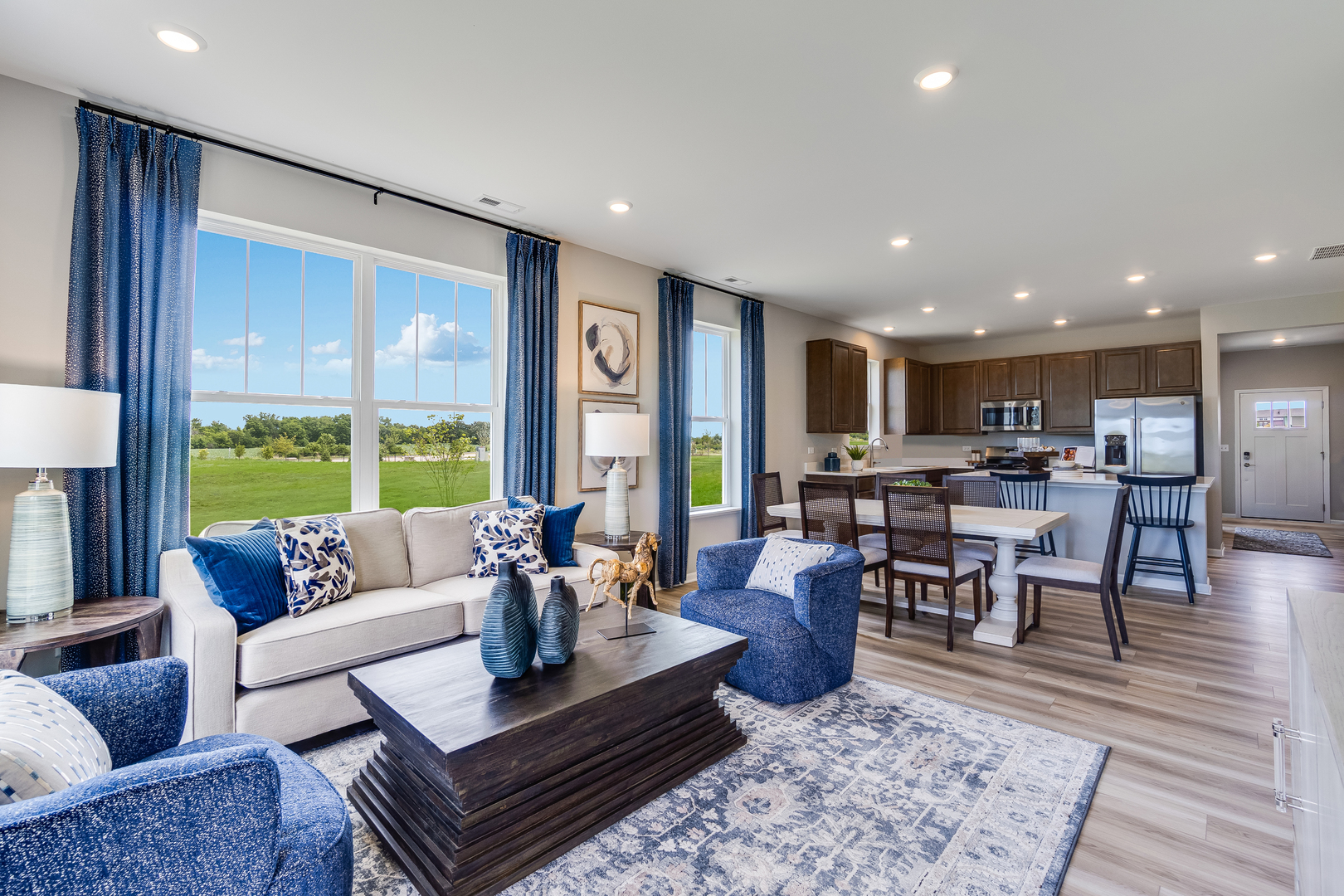 12231 Barcroft Circle Huntley, IL 60142 - Photo 13 of 38 a living room with furniture and a table