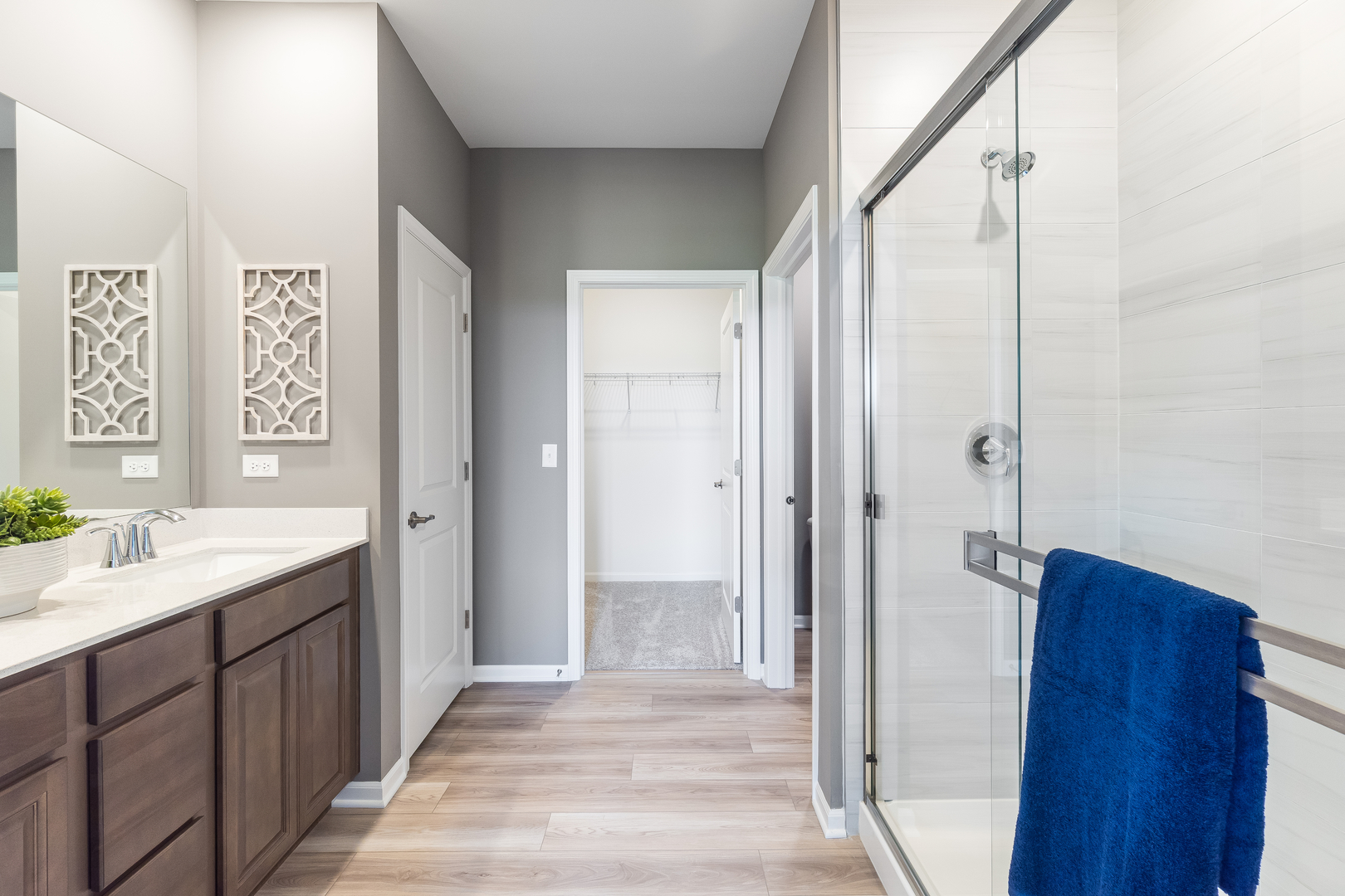 12231 Barcroft Circle Huntley, IL 60142 - Photo 22 of 38 a bathroom with a sink and a mirror
