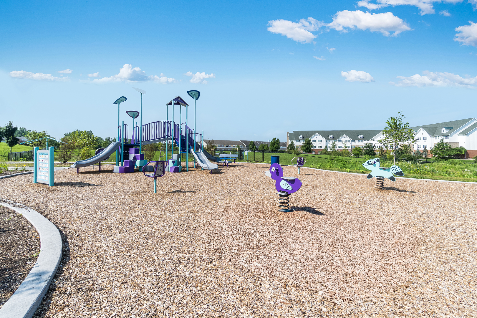 12231 Barcroft Circle Huntley, IL 60142 - Photo 35 of 38 a view of a park with swings