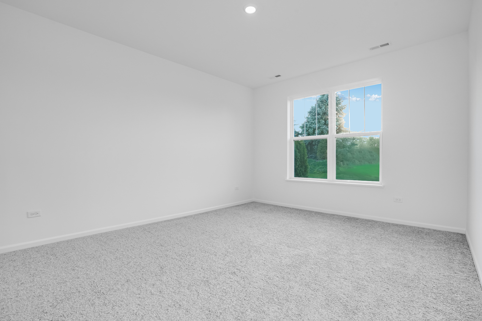 12231 Barcroft Circle Huntley, IL 60142 - Photo 9 of 38 an empty room with windows