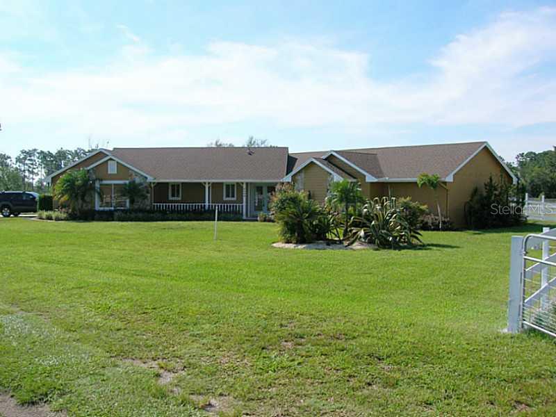 6900 Whispering Pines Road Orlando, FL 32824 - Photo 1 of 1 Exterior Front - Front of the home as you enter.