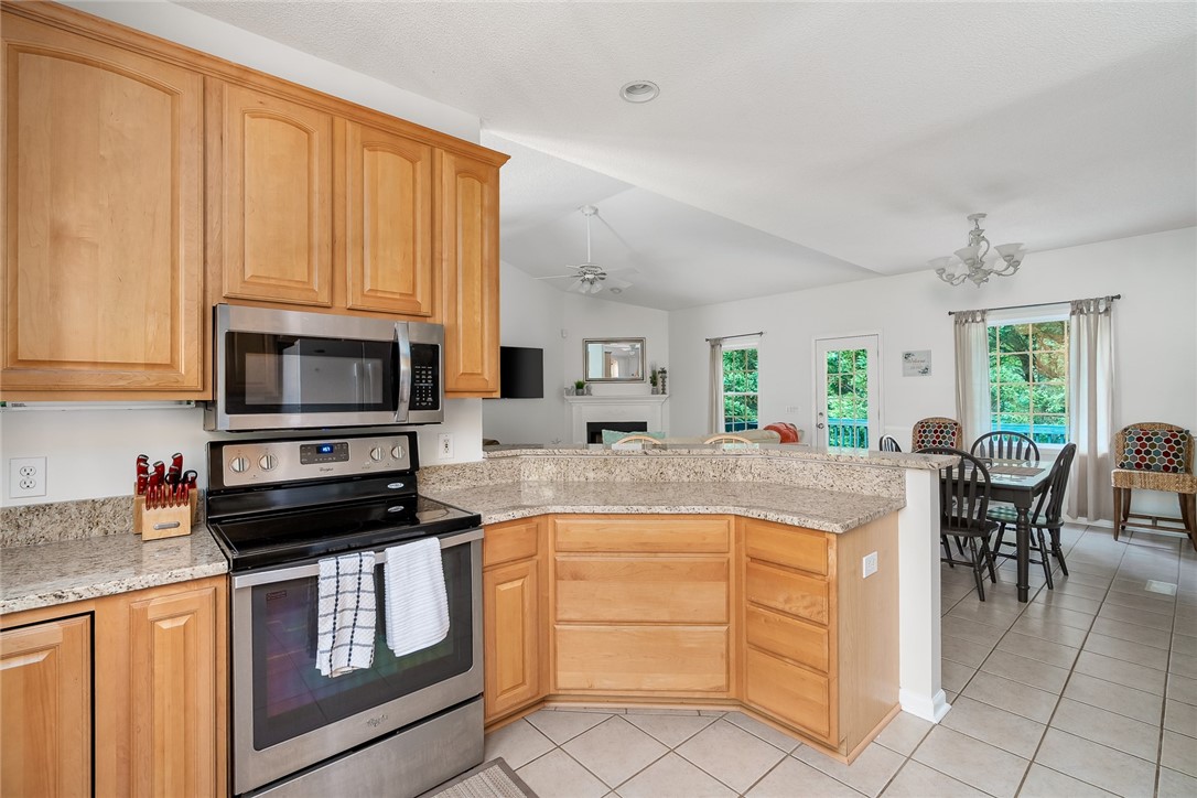 15025 Beacon Ridge Drive Seneca, SC 29678 - Photo 12 of 41 Kitchen is open to the dining area and great room