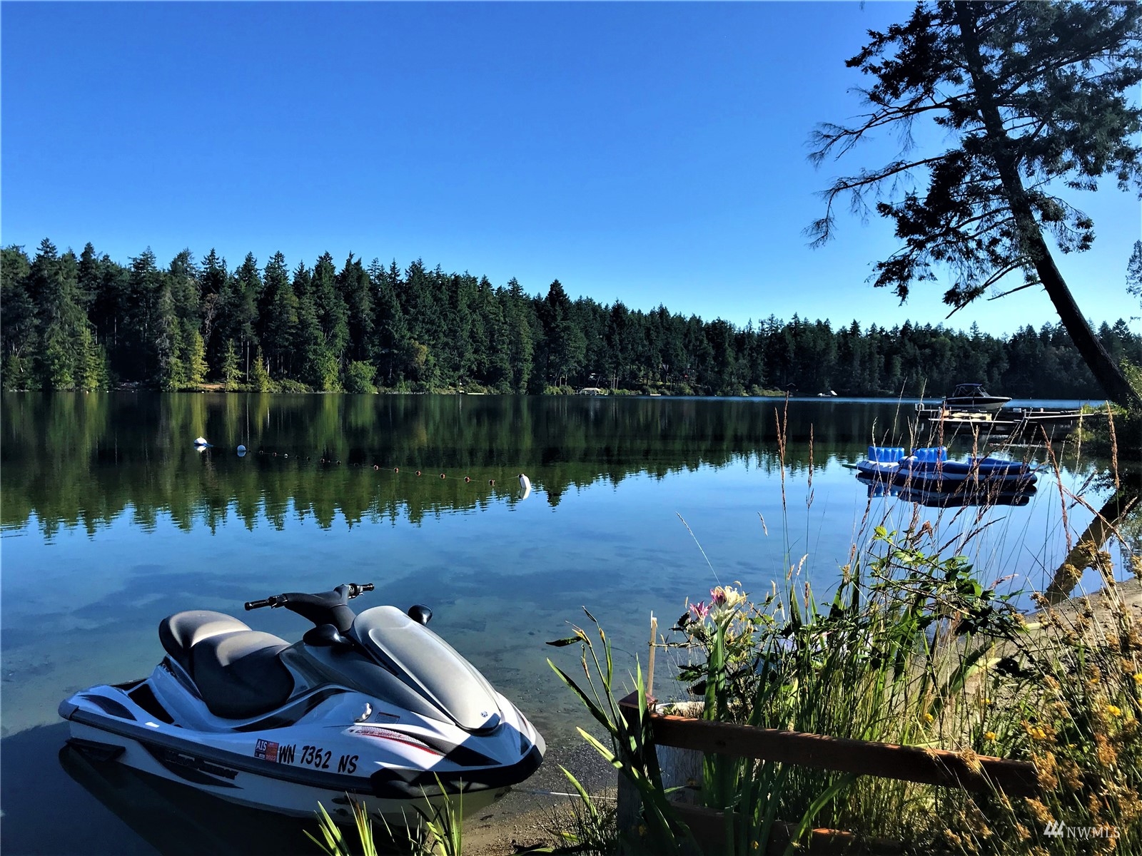 9024 Johnson Road Anderson Island, WA 98303 - Photo 3 of 18 a lake view with a sitting space and lake view
