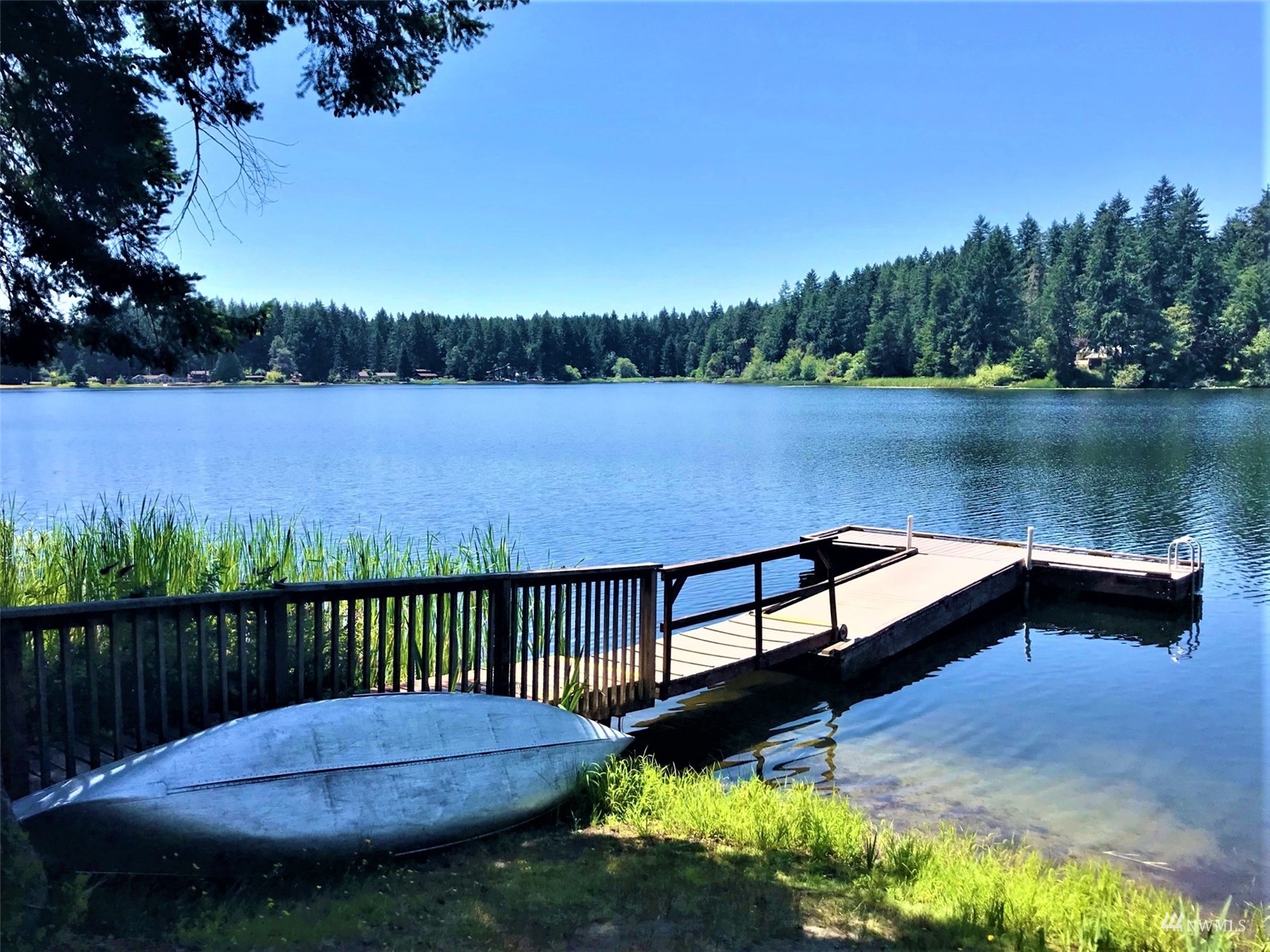 9024 Johnson Road Anderson Island, WA 98303 - Photo 8 of 18 a view of a lake with a garden