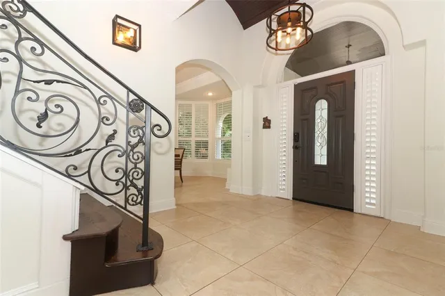 a kitchen with wooden cabinets and a stove top oven