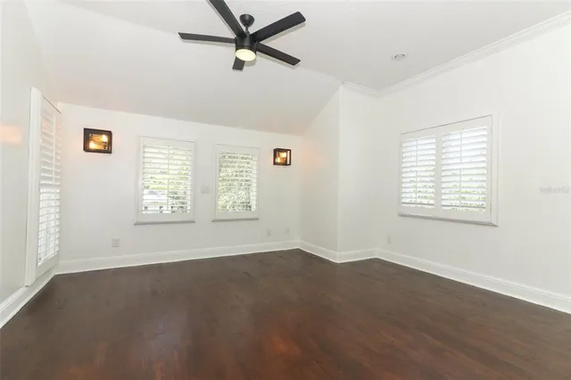 a bathroom with a sink toilet and mirror