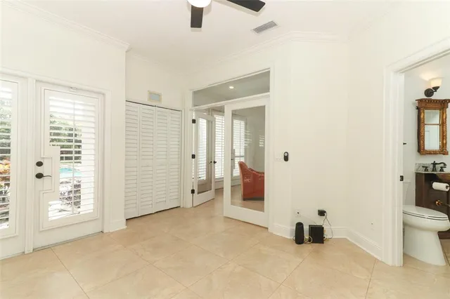 a bathroom with a shower and a window