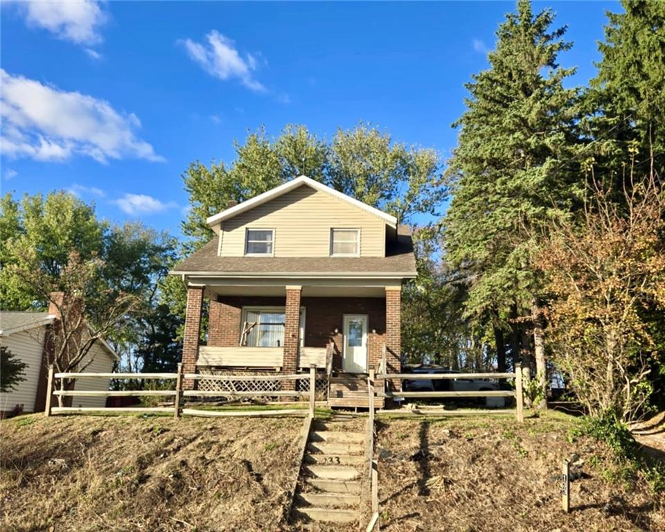 133 Freeport Road Butler, PA 16002 - Photo 1 of 26 a front view of a house with garden