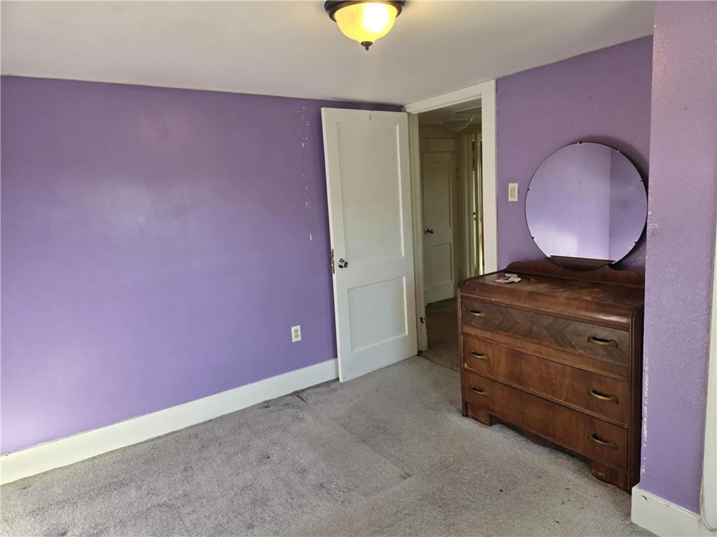 133 Freeport Road Butler, PA 16002 - Photo 19 of 26 a room with cabinets and wooden floor