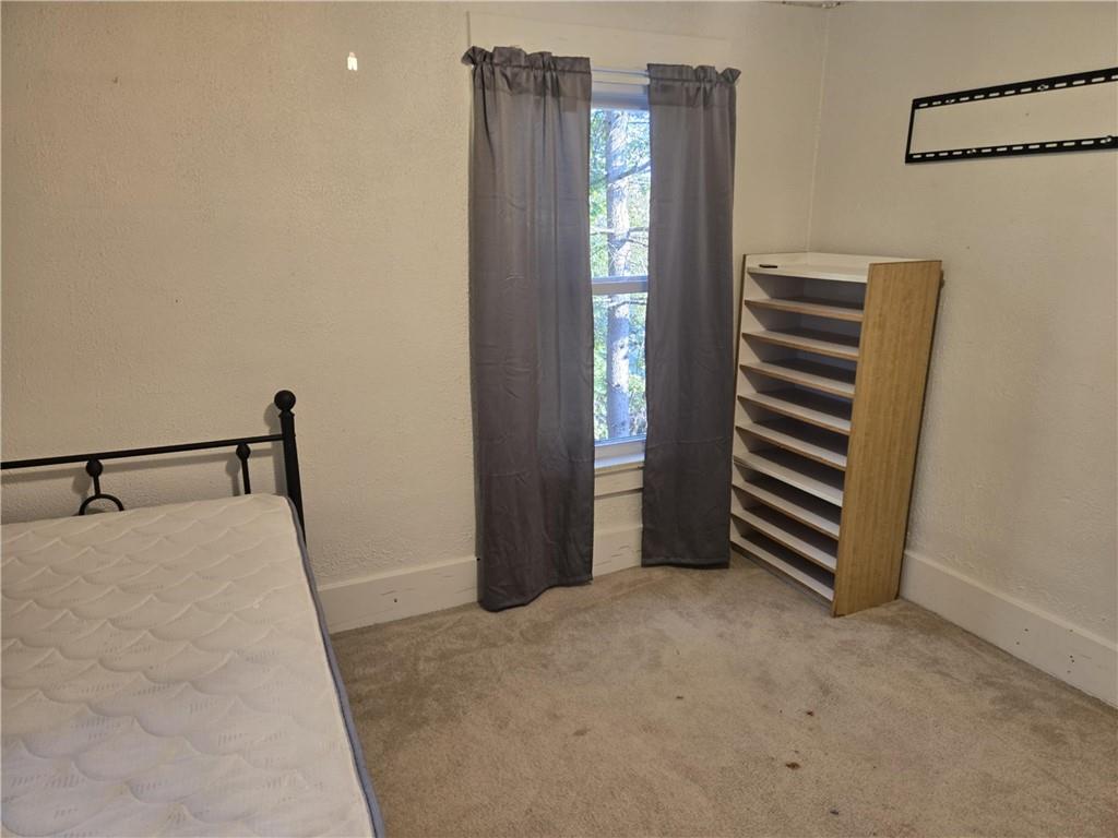 133 Freeport Road Butler, PA 16002 - Photo 21 of 26 a view of an empty room with stairs