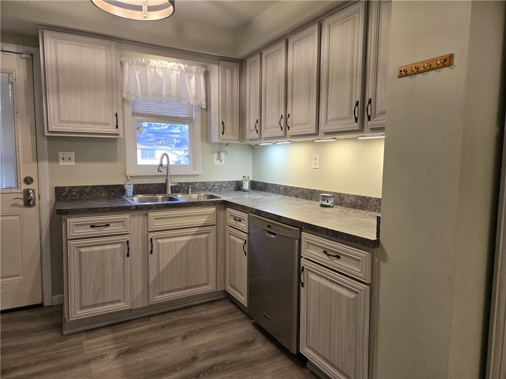 133 Freeport Road Butler, PA 16002 - Photo 4 of 26 a kitchen with stainless steel appliances granite countertop a sink stove and cabinets