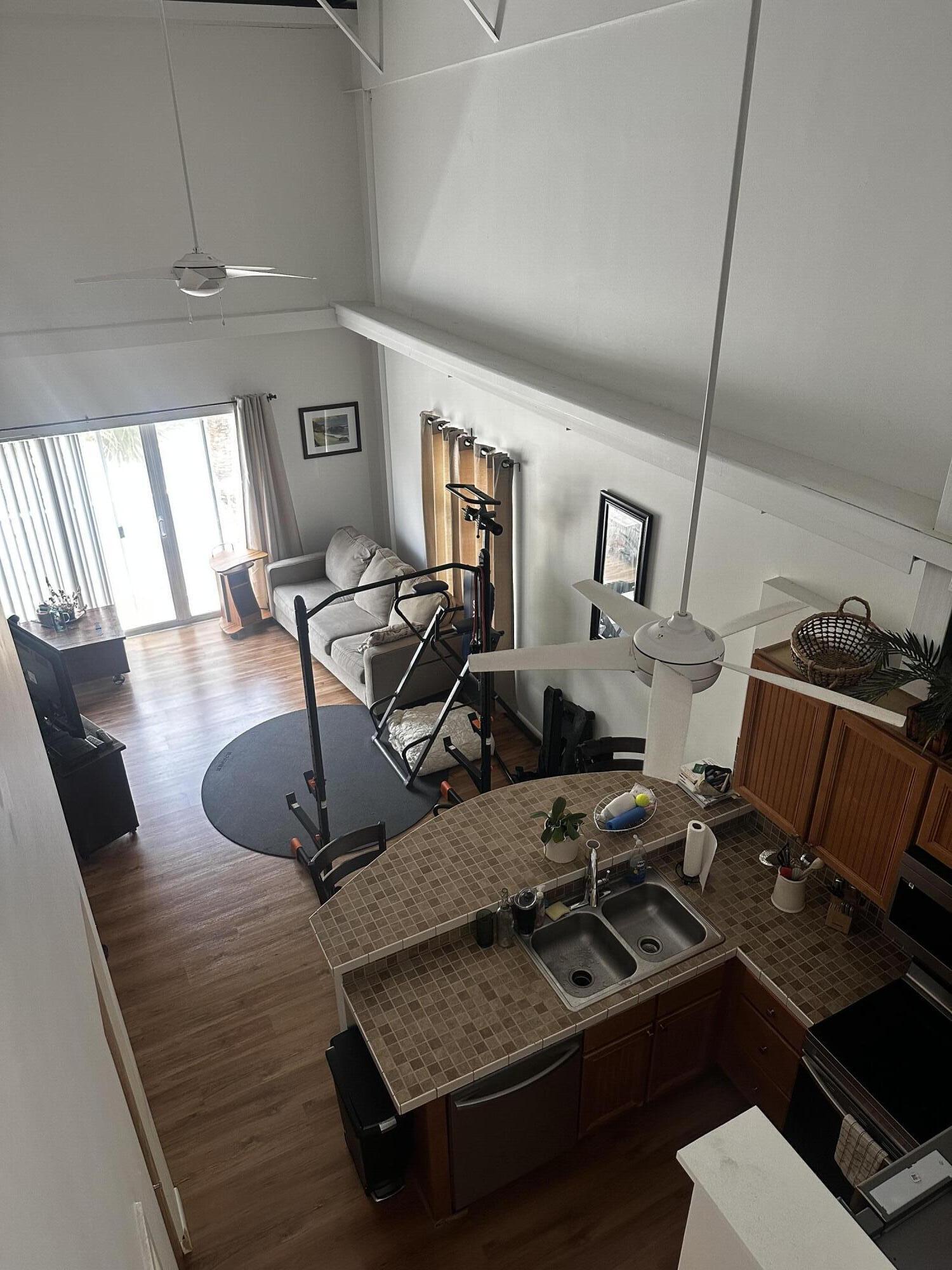 431 Northeast Baker Road Stuart, FL 34994 - Photo 3 of 9 Kitch-LR from Top of Loft