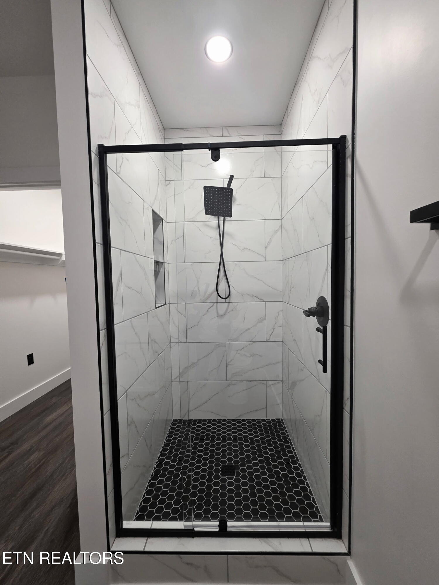 507 North Street Newport, TN 37821 - Photo 26 of 27 Step in shower in the primary bathroom