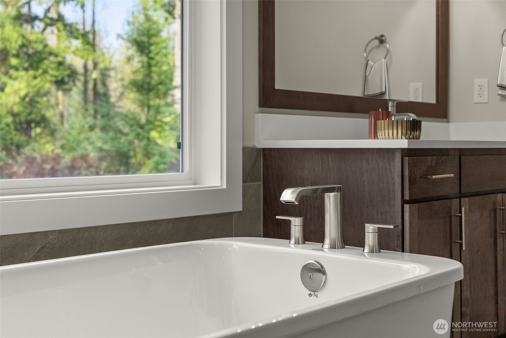 3303 107th Avenue Southwest Olympia, WA 98512 - Photo 19 of 37 a bathroom with a sink and a mirror