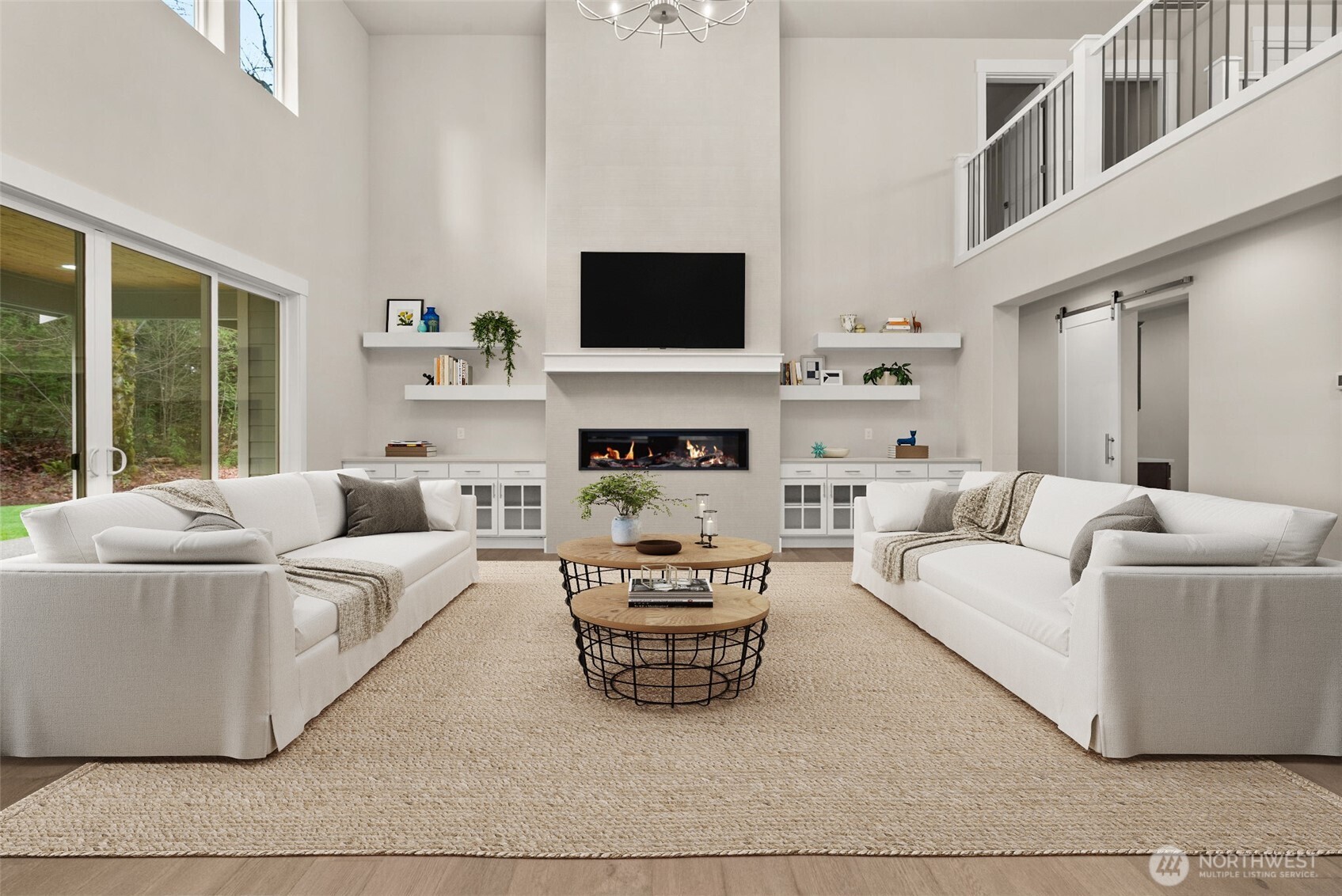 3303 107th Avenue Southwest Olympia, WA 98512 - Photo 3 of 37 a living room with furniture a flat screen tv and a fireplace