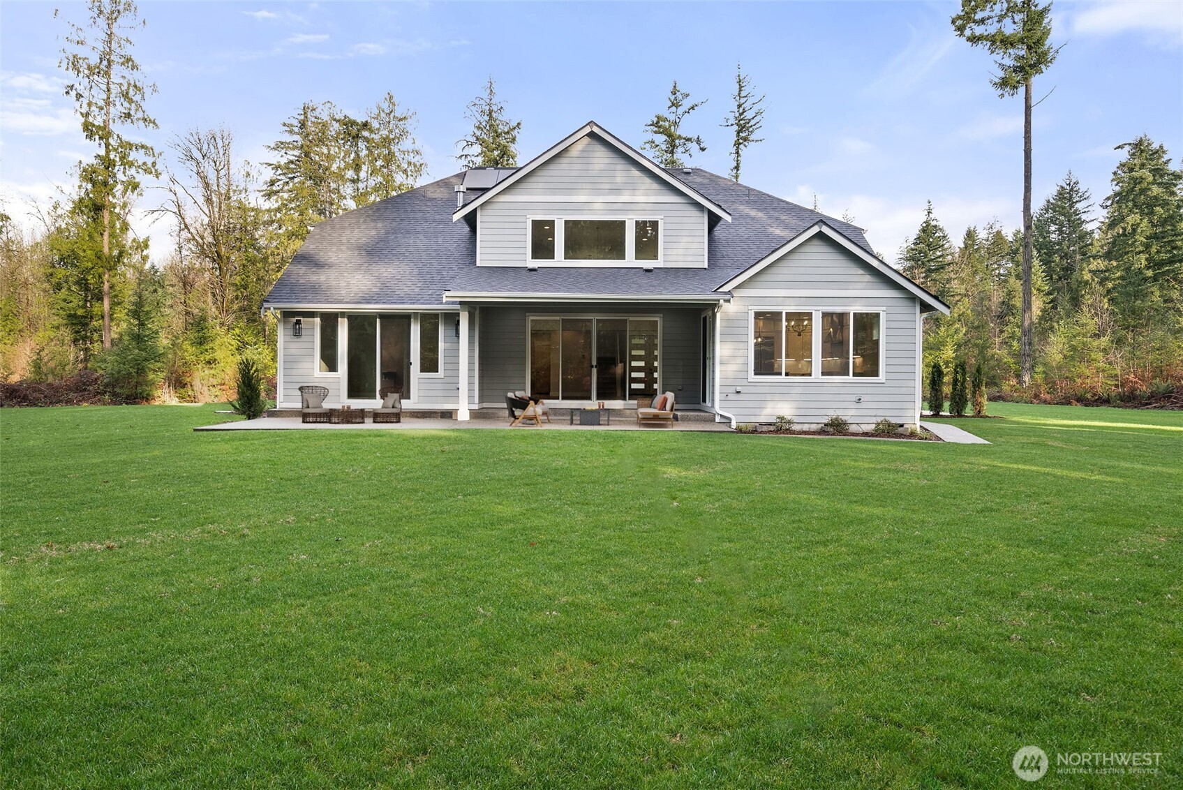 3303 107th Avenue Southwest Olympia, WA 98512 - Photo 33 of 37 a front view of house with yard and green space