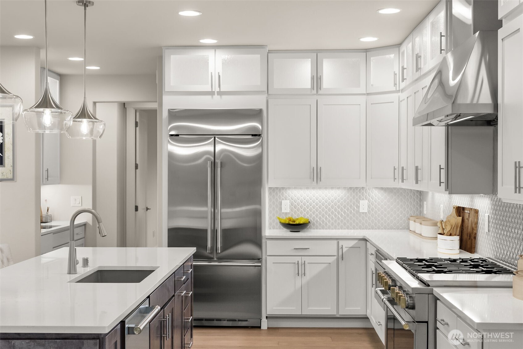 3303 107th Avenue Southwest Olympia, WA 98512 - Photo 5 of 37 a kitchen that has a lot of cabinets a sink and a stove