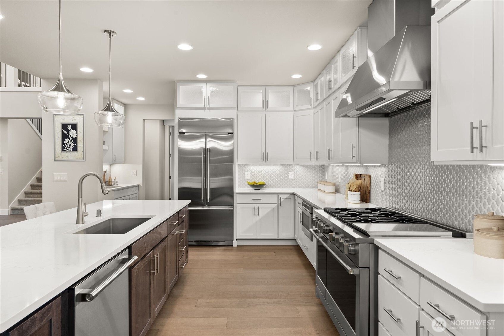 3303 107th Avenue Southwest Olympia, WA 98512 - Photo 8 of 37 a kitchen with a sink stainless steel appliances and cabinets