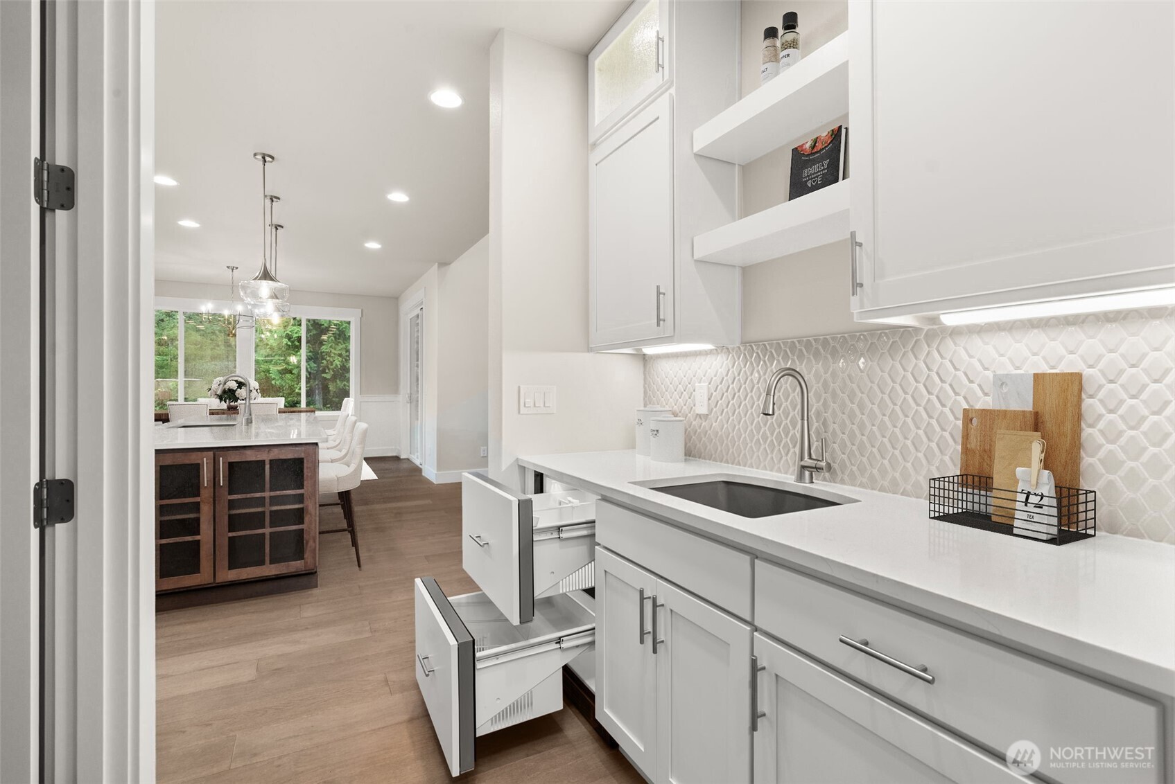 3303 107th Avenue Southwest Olympia, WA 98512 - Photo 9 of 37 a kitchen with white cabinets and sink