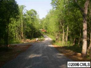 B B Dapple Ridge Road Waxhaw, NC 28173 - Photo 2 of 6 a view of a street with lots of trees