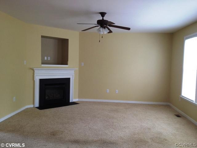 2913 Burley Ridge Terrace Chester, VA 23831 - Photo 3 of 12 a view of empty room with a fireplace