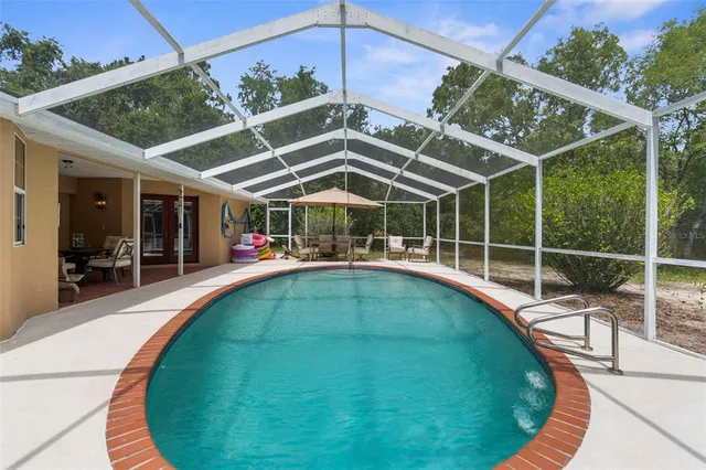 a bedroom with a bed and flat screen tv