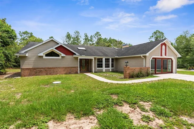 $995,000 | 17131 Dalberg Drive, Spring Hill, FL 34610