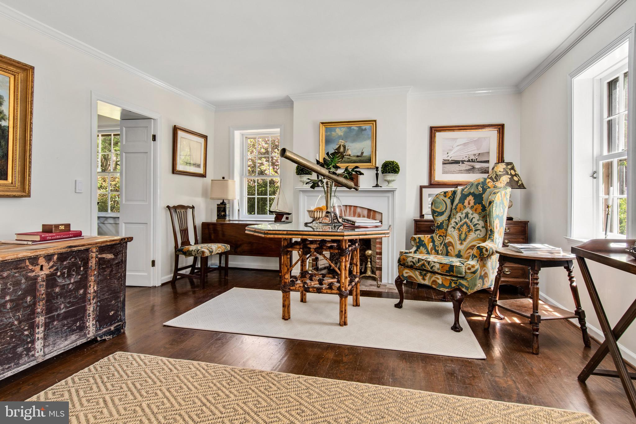 105 Thompson Street St. Michaels, MD 21663 - Photo 4 of 24 Living room! w/view of second fireplace