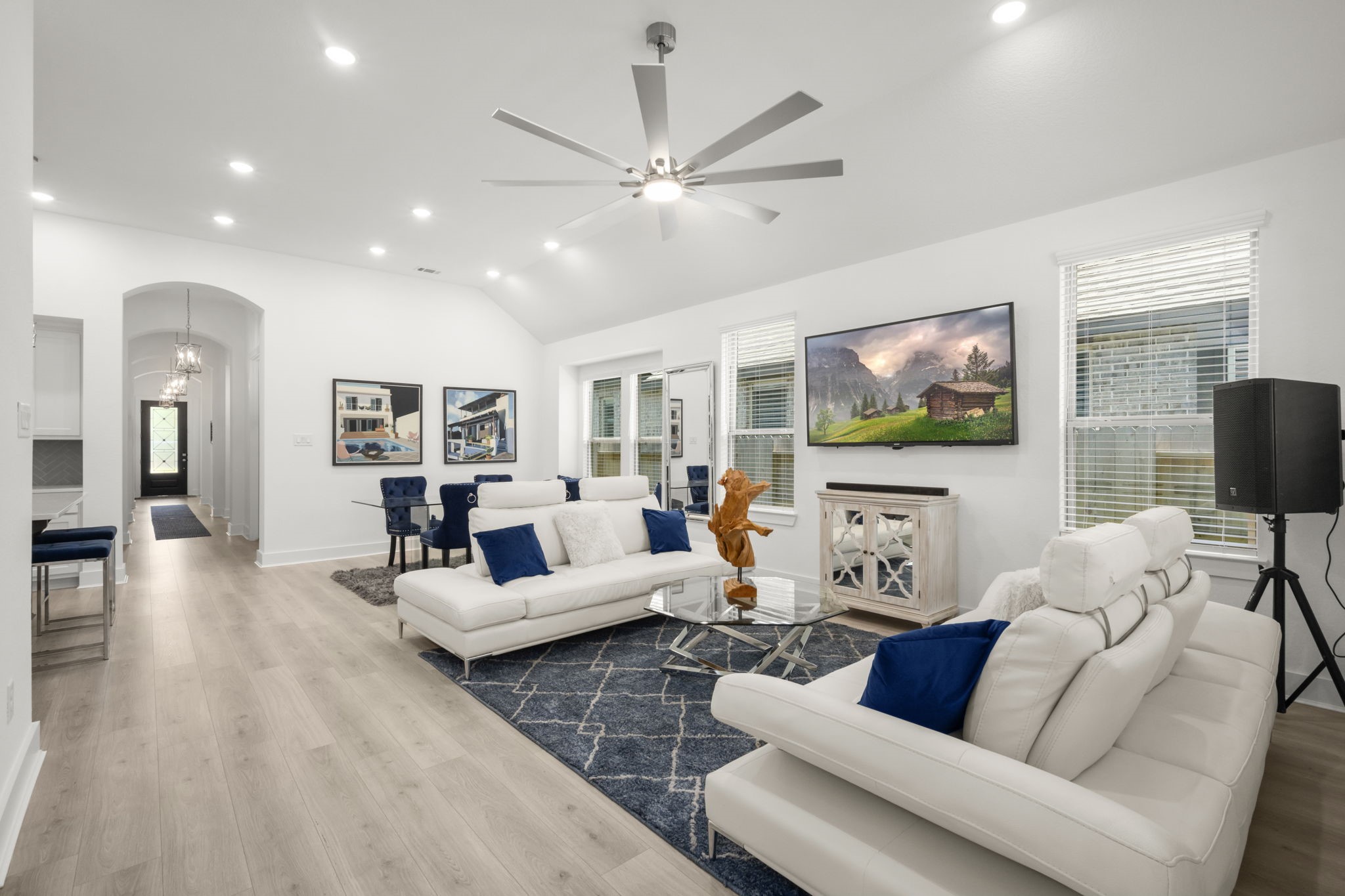 13035 Wandering Rdg Lane Conroe, TX 77302 - Photo 5 of 28 a living room with furniture and a flat screen tv