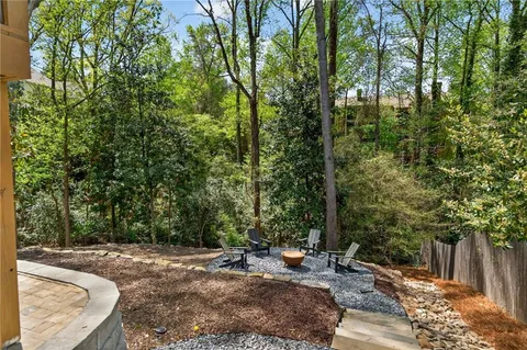 a backyard of a house with lots of green space