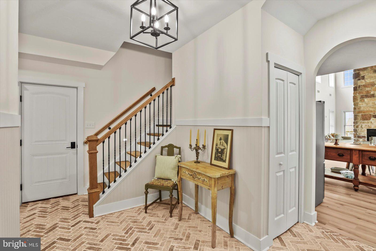 4340 Lee Road Glenville, PA 17329 - Photo 3 of 42 a view of a hallway with wooden floor and staircase