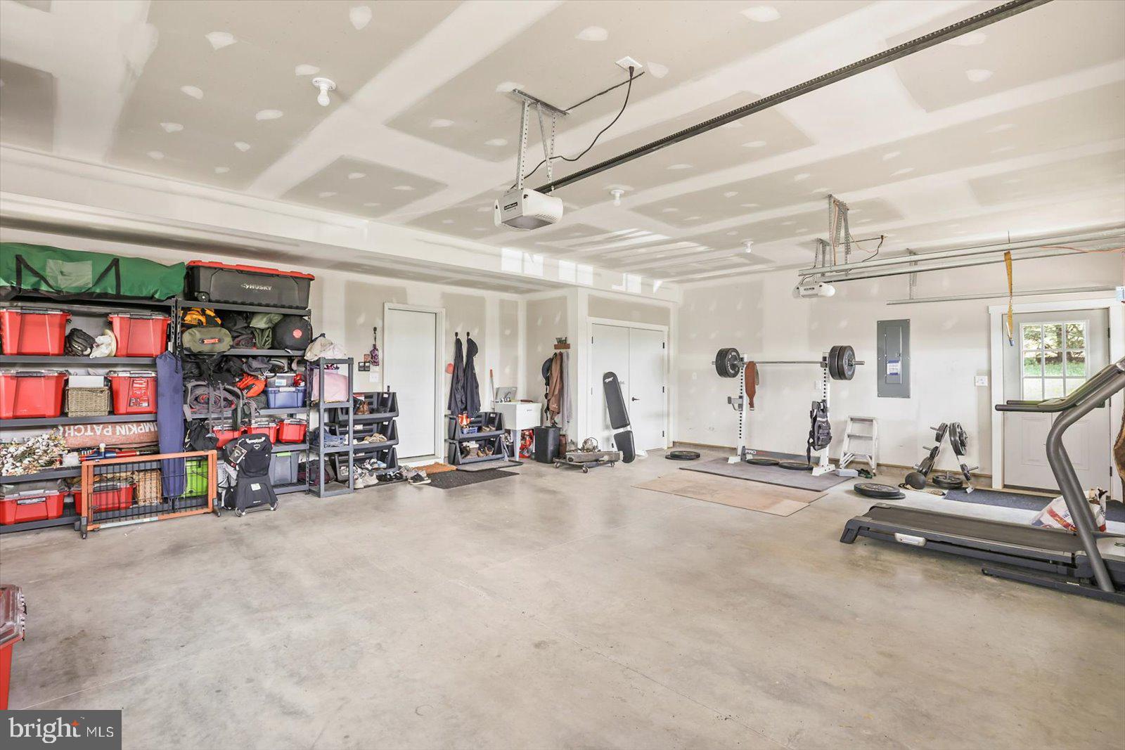 4340 Lee Road Glenville, PA 17329 - Photo 32 of 42 a view of a garage with gym equipment