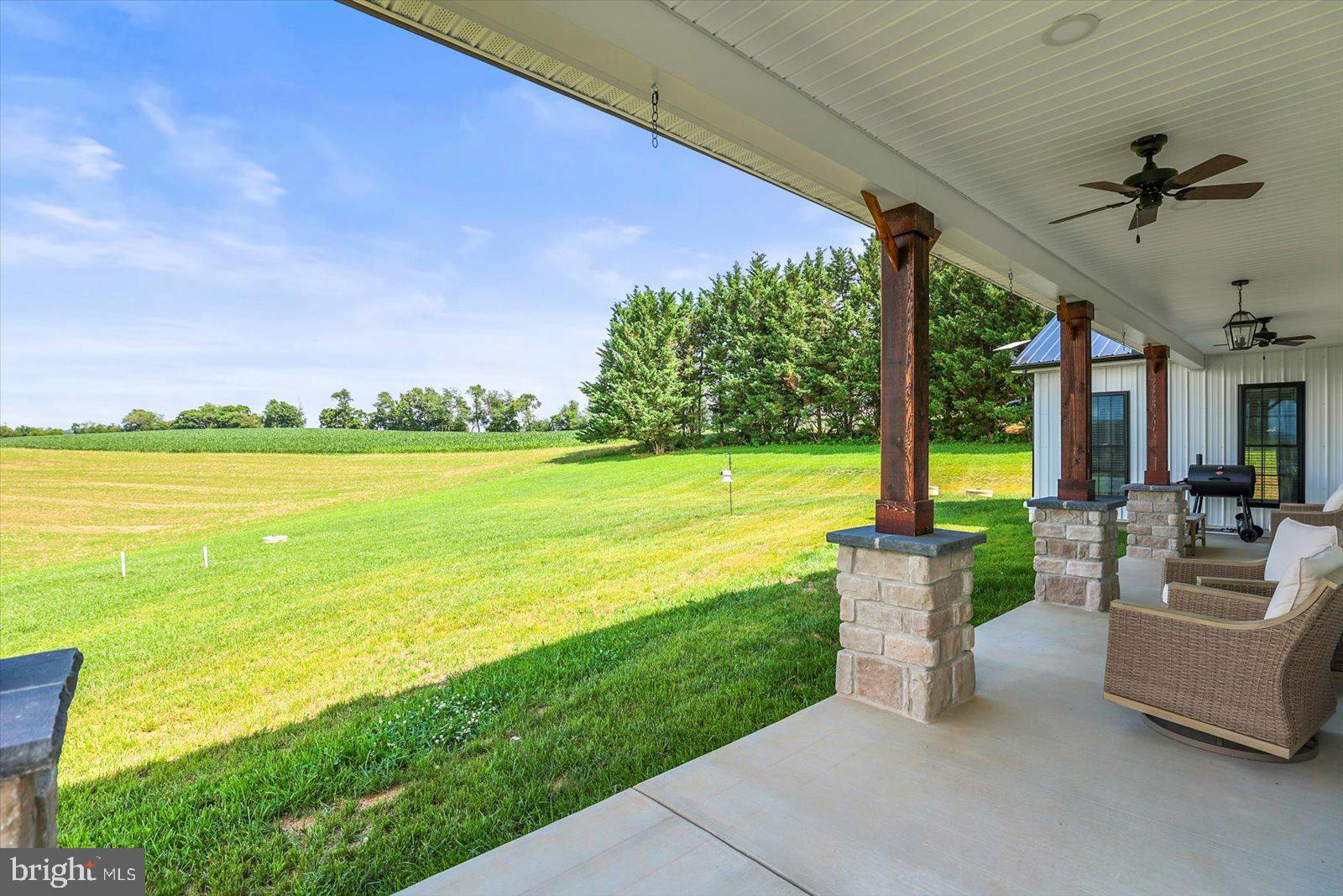 4340 Lee Road Glenville, PA 17329 - Photo 39 of 42 a patio with water view and a big yard
