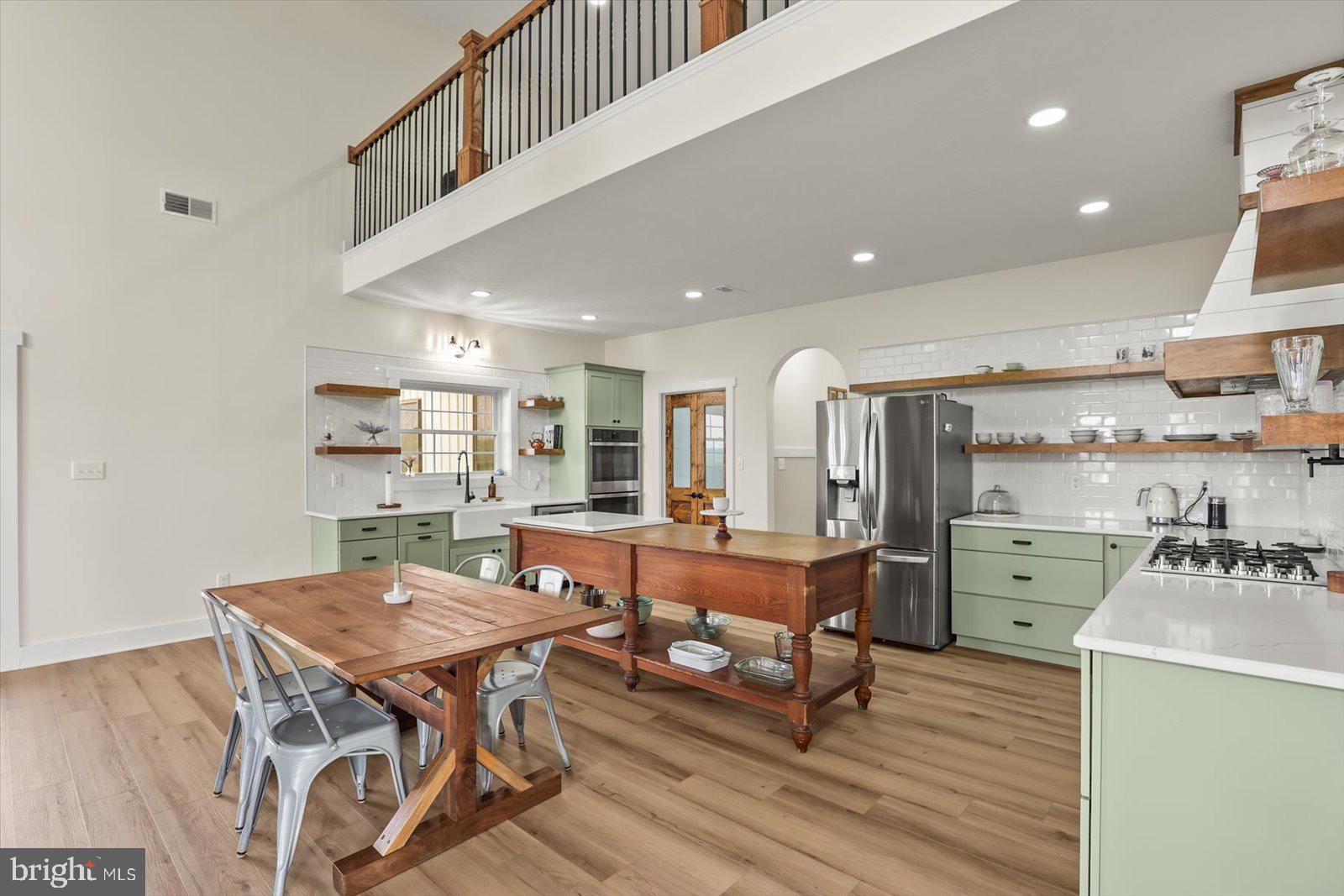 4340 Lee Road Glenville, PA 17329 - Photo 7 of 42 a kitchen with a table and chairs in it