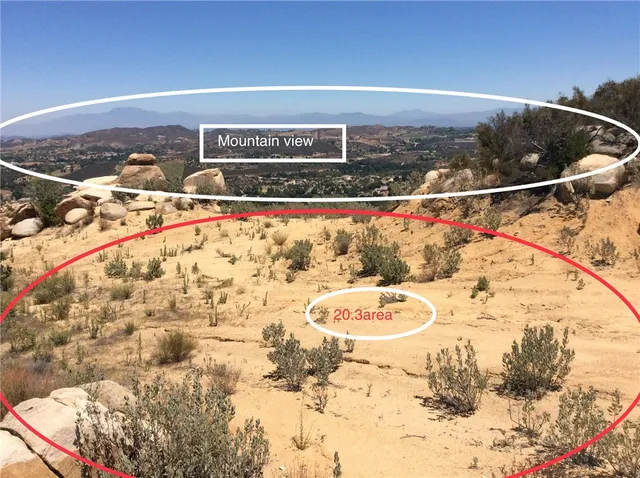 a sign that is sitting on a brick wall