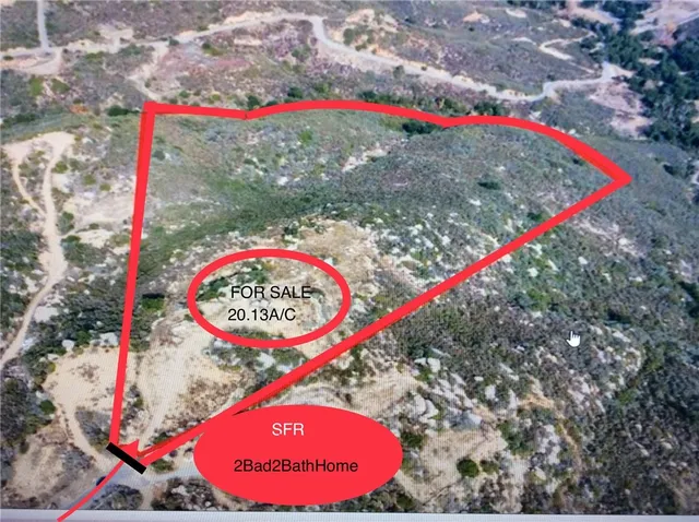 a view of a city street with a mountain