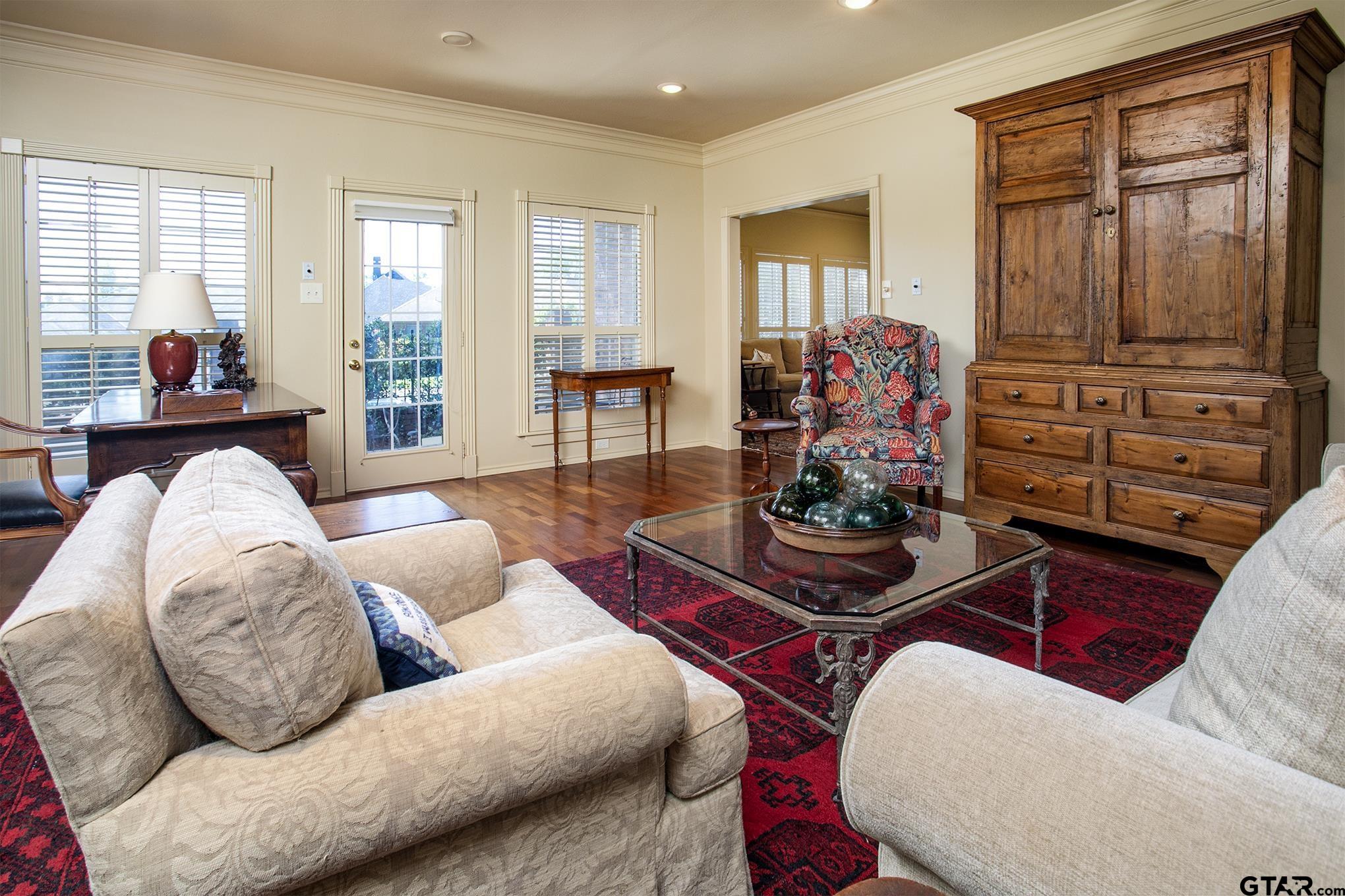 1418 Hollytree Place Tyler, TX 75703 - Photo 11 of 46 a living room with furniture and a window