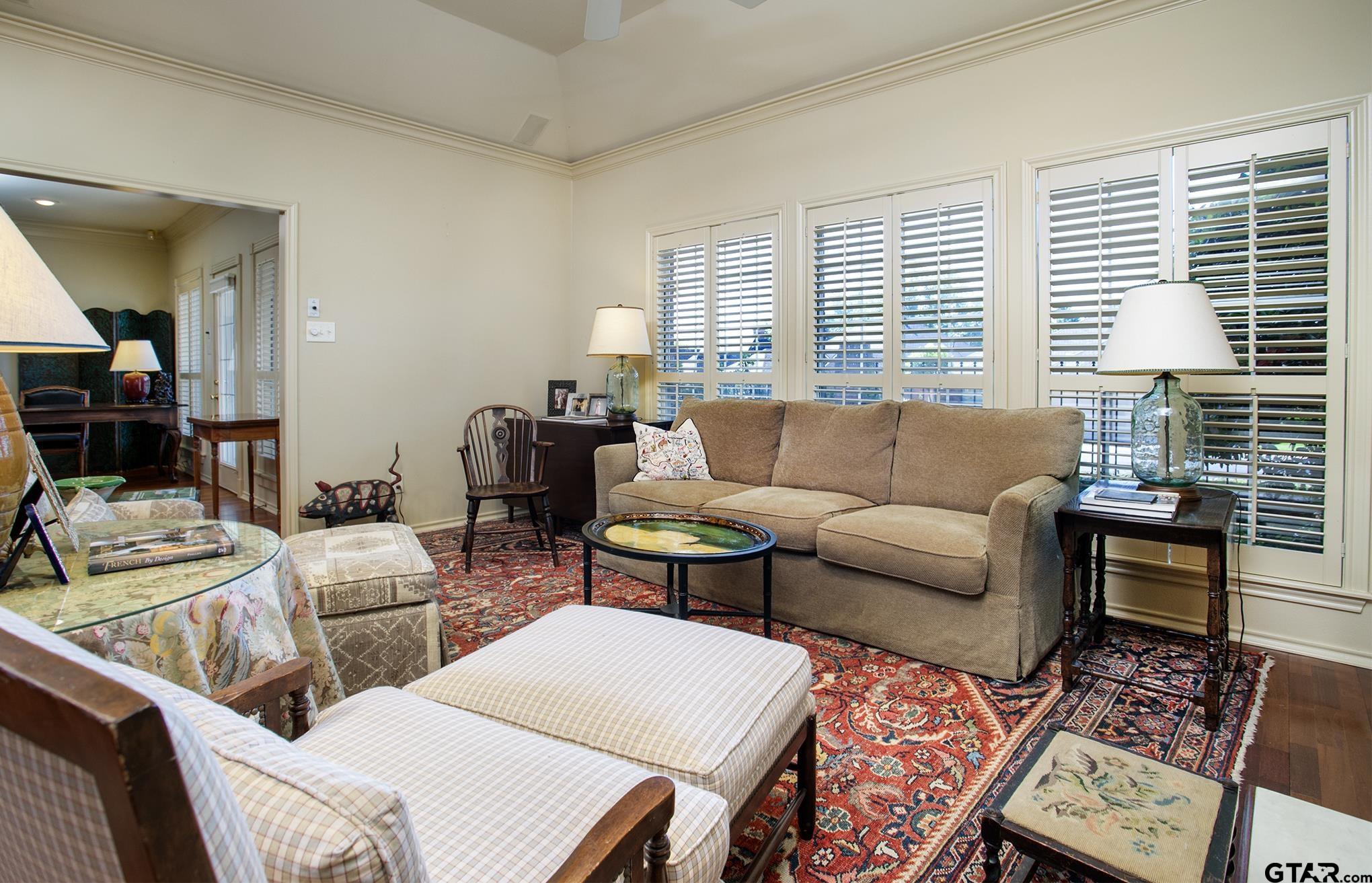 1418 Hollytree Place Tyler, TX 75703 - Photo 14 of 46 a living room with furniture and two large window