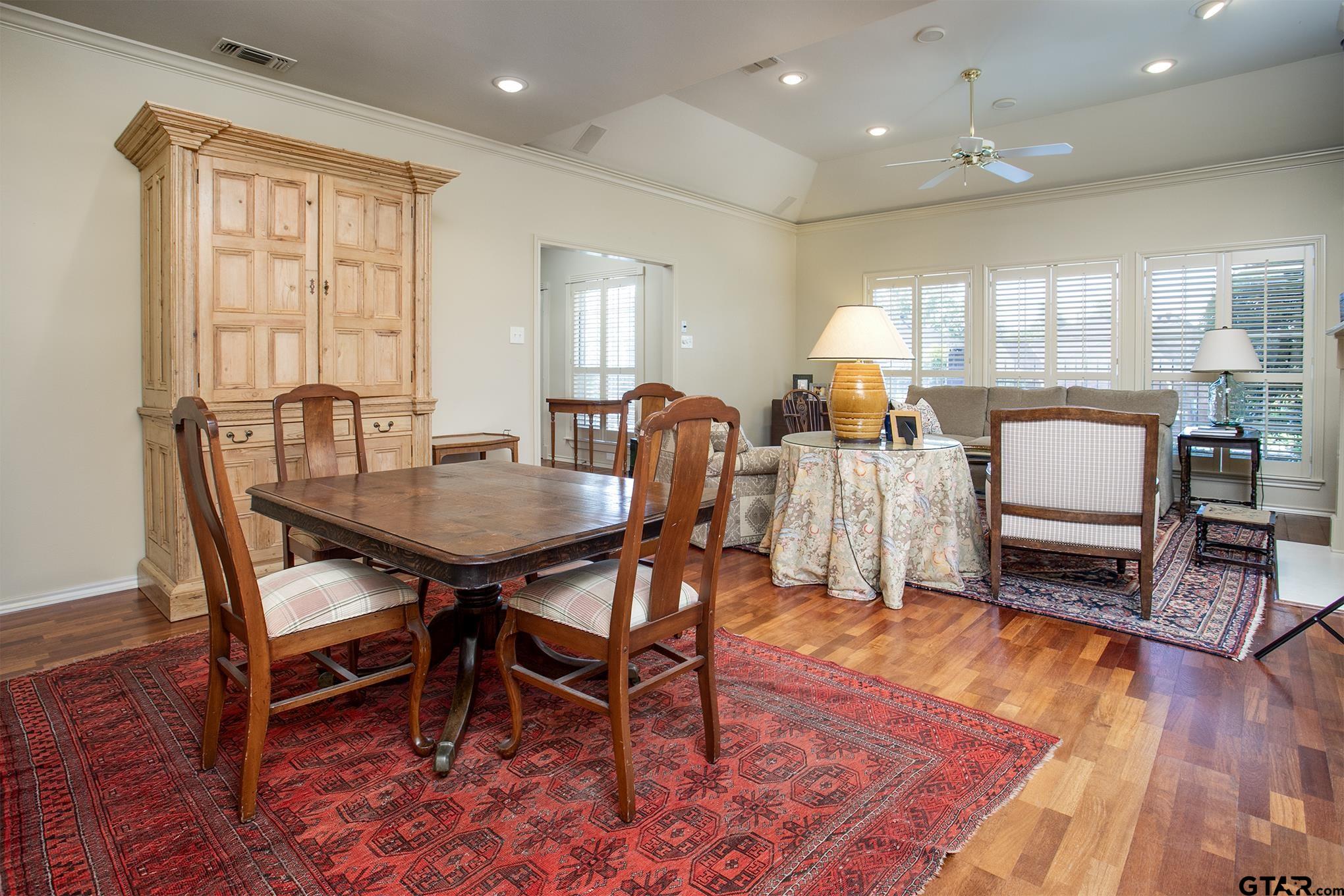 1418 Hollytree Place Tyler, TX 75703 - Photo 15 of 46 a dining room with furniture window and wooden floor