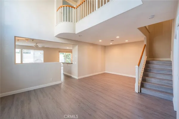 a view of entryway with wooden floor
