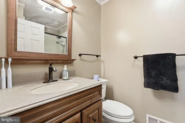 a bedroom with bed and a window