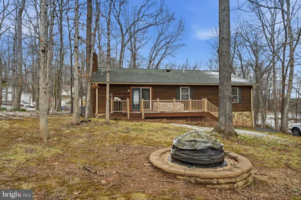 a view of a balcony with wooden floor